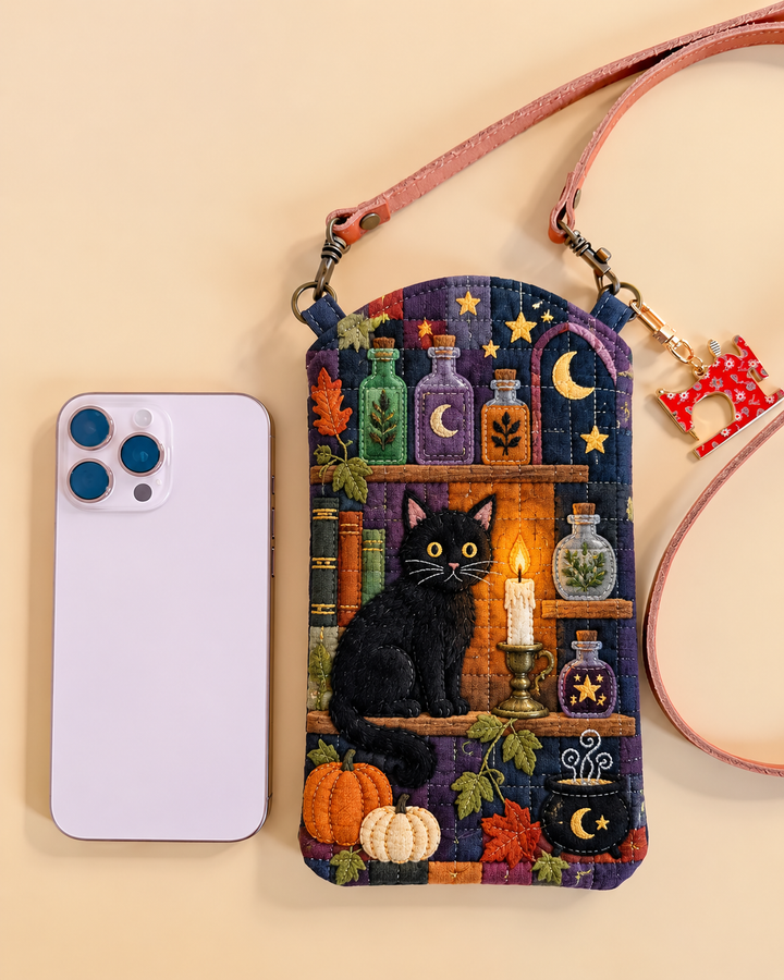 Sacoche pour téléphone portable étroite matelassée – Chat noir dans la bibliothèque des sorcières