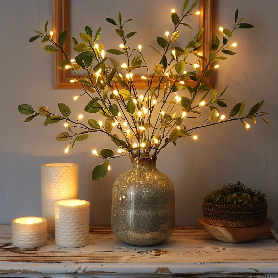 Branche d'olive avec lumières décoratives