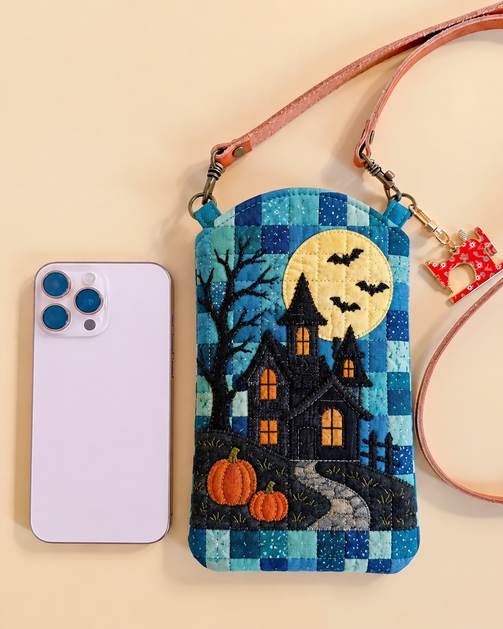 Sac à bandoulière étroit matelassé pour téléphone – Maison hantée sous la pleine lune